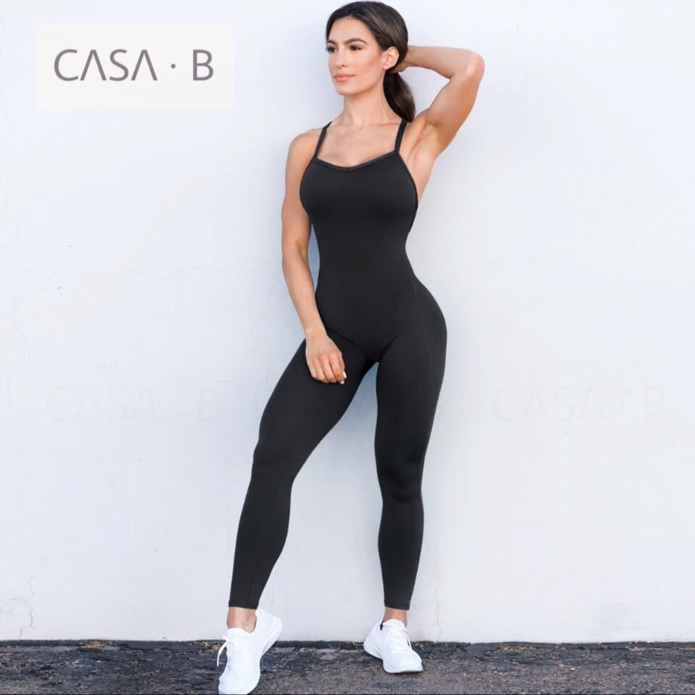 NEW ARRIVAL!!💫CASA B FITNESS| ELEVATE Cross back lux Active Jumpsuit in Black